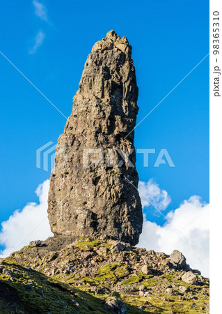 A rocky pinnacle of the Old Man of Storr cliffs in the Isle of Skye in Scotland. 98365310