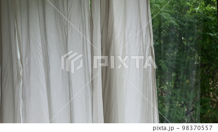 white curtain in the room with natural background white curtain in the room with natural background 98370557