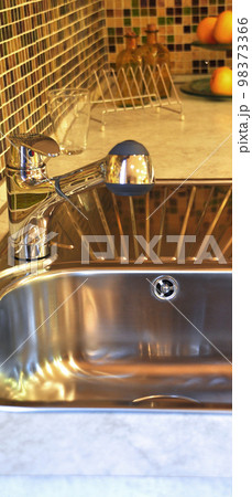 Interior of modern kitchen and stainless steel sink, tap and drain 98373366