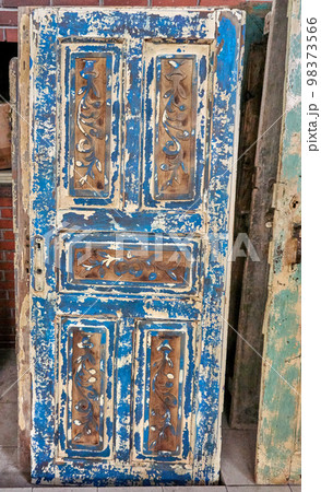 Traditional handmade wooden door in near plan Traditional handmade wooden door in near plan 98373566