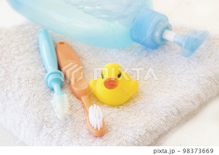 toothbrush of baby with liquid soap, terry cloth health care of baby toothbrush of baby with liquid soap, terry cloth health care of baby 98373669