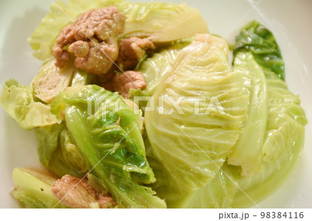 fried Brussels sprout with slice pork in oyster sauce on plate fried Brussels sprout with slice pork in oyster sauce on plate 98384116