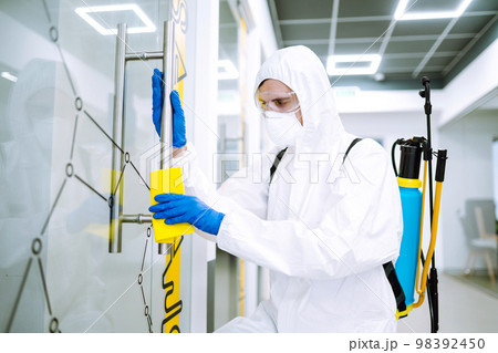 Cleaning and disinfection of office to prevent COVID-19. Prevention of spreading pneumonia virus. 98392450