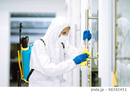 Cleaning and disinfection of office to prevent COVID-19. Prevention of spreading pneumonia virus. 98392451