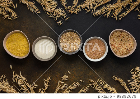Grain cereals in bowls Grain cereals in bowls 98392679