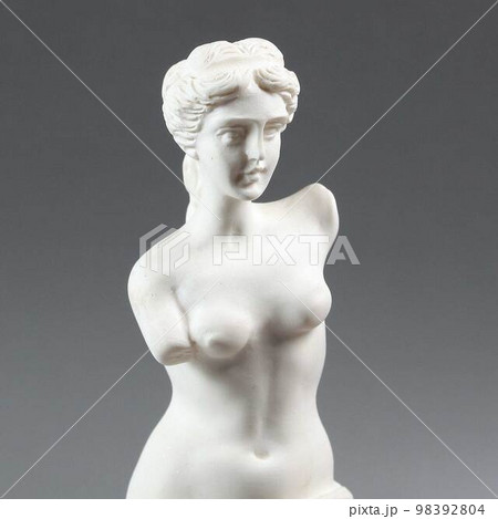 Torso to the waist of a woman plastic figurine white color Torso to the waist of a woman plastic figurine white color 98392804