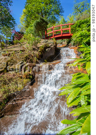 Awe waterfall in japanese garden in Kaiserslautern in April Awe waterfall in japanese garden in Kaiserslautern in April 98393047