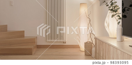 A cozy Home interior in warm beige tones in Japanese and Scandinavian Style. Modern Scandinavian Living Room Interior Design. Japandi Concept A cozy Home interior in warm beige tones in Japanese and Scandinavian Style. Modern Scandinavian Living Room Interior Design. Japandi Concept 98393095
