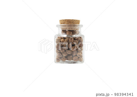 brown chickpeas in a glass jar isolated on white background. nutrition. food ingredient. 98394341