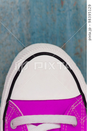 etro sneaker sock, close-up, on a blue wooden background 98395129