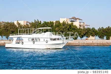 Boat at the pier in the Red Sea in Egypt, Africa Boat at the pier in the Red Sea in Egypt, Africa 98395140
