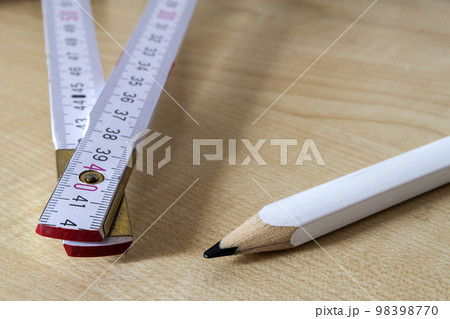 Measuring tape meter and pensil. Construction tools. Measuring tape meter and pensil. Construction tools. 98398770