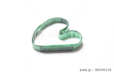 a measuring tape in the shape of a heart on a white background, with copy space for your text stock photo a measuring tape in the shape of a heart on a white background, with copy space for your text stock photo 98399159