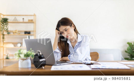 Young woman stressed or worried about doing a wrong job, Despair or disappointment, Sad feeling, Suffering, Desperate, Hopeless, Fail, disastrous, bankrupt, Scared, panicky, Failure of life. Young woman stressed or worried about doing a wrong job, Despair or disappointment, Sad feeling, Suffering, Desperate, Hopeless, Fail, disastrous, bankrupt, Scared, panicky, Failure of life. 98405681
