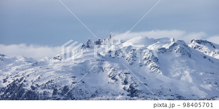 Snow and Cloud covered Canadian Nature Landscape Background. Winter Season in Whistler Snow and Cloud covered Canadian Nature Landscape Background. Winter Season in Whistler 98405701