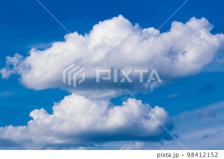 Beautiful white clouds against the blue sky Beautiful white clouds against the blue sky 98412152