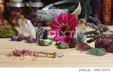 Dried Flowers and Crystal Stones on Meditation Altar Shallow DOF Dried Flowers and Crystal Stones on Meditation Altar Shallow DOF 98413973
