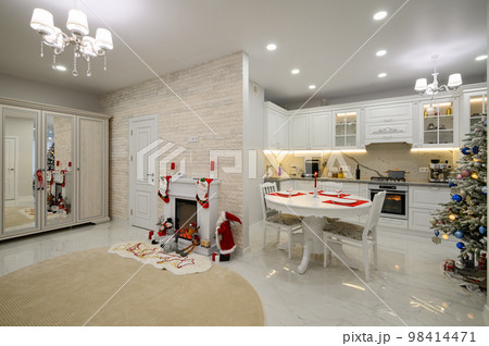 Interior of bright modern kitchen decorated for Christmas 98414471