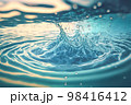 水面に落ちた水滴が飛び散るイメージ（AI生成） 98416412