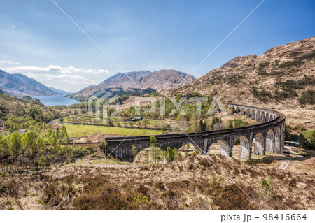 Famous Glenfinnan Railway Viaduct with beautiful countryside in Scotland, UK 98416664