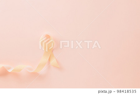 World cancer day concept. ribbons on pink background, cancer awareness, Banner design, healthcare support symbol World cancer day concept. ribbons on pink background, cancer awareness, Banner design, healthcare support symbol 98418535
