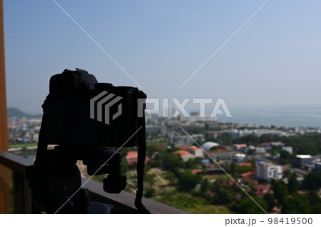 black digital camera shooting city landscape 98419500