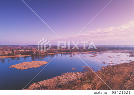 View from above of countryside and river et sunset. Nature landscape. Early spring View from above of countryside and river et sunset. Nature landscape. Early spring 98421621