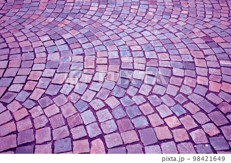 Colorful granite blocks. Stone paving gradient yellow pink texture background 98421649