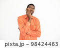 Portrait of doubtful young man leaning head on hand 98424463