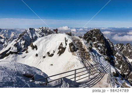 Snowy winter high mountain landscape. Snowy winter high mountain landscape. 98424789