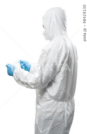 Worker wears medical protective suit or white coverall suit hand extend isolated on white Worker wears medical protective suit or white coverall suit hand extend isolated on white 98429130