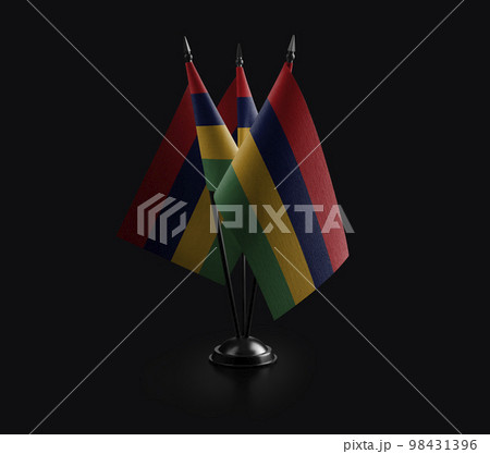Small national flags of the Mauritius on a black background Small national flags of the Mauritius on a black background 98431396