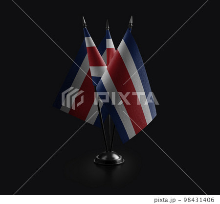 Small national flags of the Costa Rica on a black background 98431406
