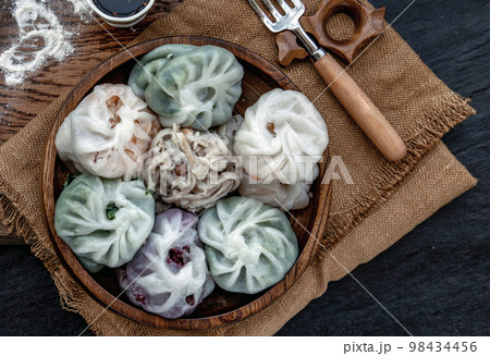 Chinese chives Dumplings Mixed Color or Garlic Chives Dim Sum Rice Cake inside with Taro Slice ,Bamboo shoot and Many kind of vegetable inside the flour, Steamed Served Sweet Black Soy Sauce Chinese 98434456