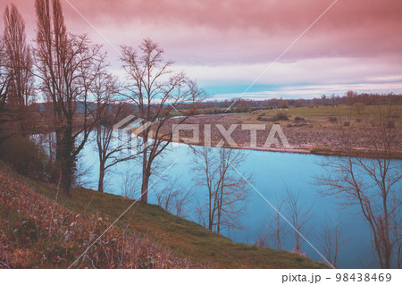 Rural landscape. River with a steep bank in autumn. Beautiful nature Rural landscape. River with a steep bank in autumn. Beautiful nature 98438469