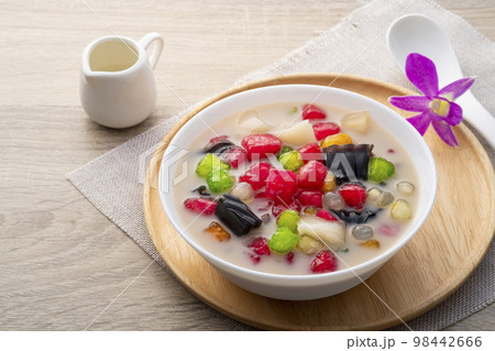 Thai iced dessert (Ruam Mit),Popular Thai dessert made with ingredients such as coconut jelly, tapioca pearls,thapthim krop,mock pomegranate seeds,Grass Jelly in coconut milk Thai iced dessert (Ruam Mit),Popular Thai dessert made with ingredients such as coconut jelly, tapioca pearls,thapthim krop,mock pomegranate seeds,Grass Jelly in coconut milk 98442666