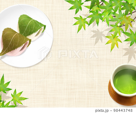 麻布のランチョンマットの上にお茶とお皿に乗った桜の葉のついた桜餅和風イラストセットー手描き背景素材 98443748
