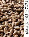 Wooden pellets in two wicker boxes. Biomass fuel 98447171