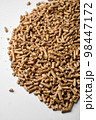 Wooden pellets in two wicker boxes. Biomass fuel 98447172