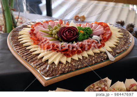Classic Croatian starter plate with Fine Croatian ham, sliced salami and cheese 98447697