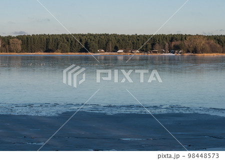 Winter lake. Snowy cold winter. Ice drift photo. Spring is coming. Winter inspiration 98448573