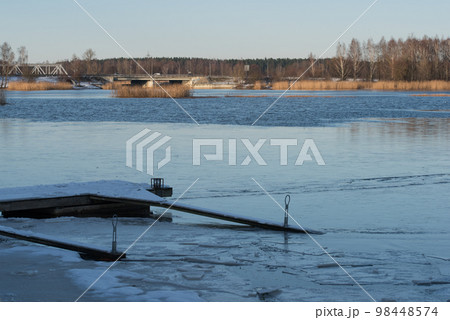 Winter lake. Snowy cold winter. Ice drift photo. Spring is coming. Winter inspiration Winter lake. Snowy cold winter. Ice drift photo. Spring is coming. Winter inspiration 98448574