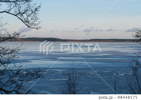 Winter lake. Snowy cold winter. Ice drift photo. Spring is coming. Winter inspiration 98448575
