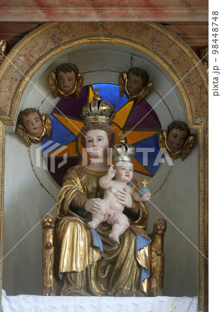 Virgin Mary with baby Jesus, statue on the main...の写真素材