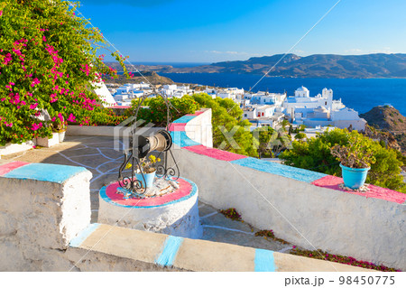 One of the cozy streets of Plaka town. Milos island, Greece 98450775