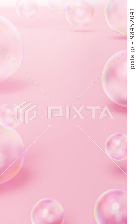 ピンク色の背景にシャボン玉が複数ある空間。（縦長） 98452041