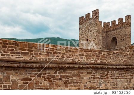 An old fortress against the blue sky. 98452250