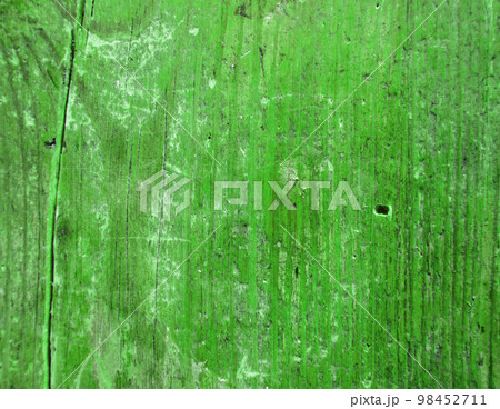 Textured background of an old vintage cracked green board 98452711