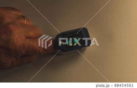 pulse oximeter on the finger pulse oximeter on the finger 98454501