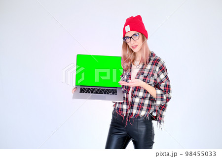 Woman with laptop white background casual freelancer 98455033
